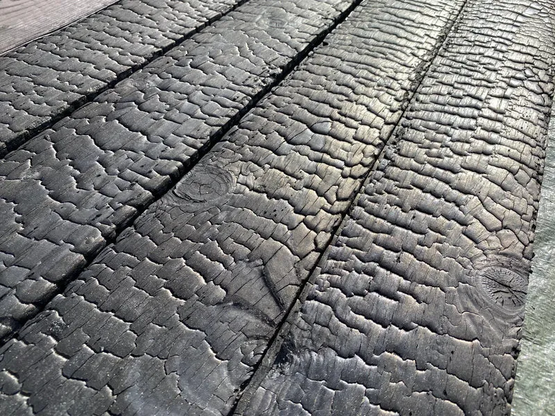 Sichtschutz Holz schwarz 95, 120, 145mm geflammt Fichte einseitig